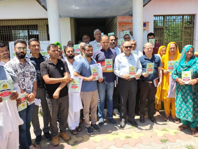 Director Horticulture Jammu Chaman Lal Sharma posing along with Board of Directors and members of FPO at Sungal, Akhnoor.