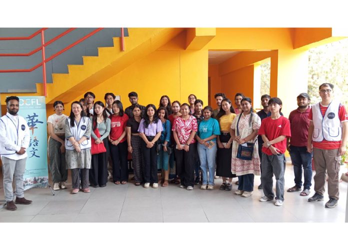 Students of Shoolini University posing for a group photograph after attending the TOCFL Mandarin exam on Sunday.