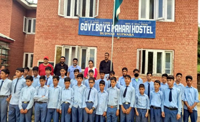 Secretary J&K Advisory Board alongwith students and staff members of Govt Boys Pahari Hostel posing for a group photograph.