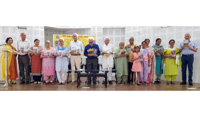 Dr. Lalit Magotra, President, Dogri Sanstha along with others releasing poetry books of Dr Nirmal Vinod in Jammu on Monday.