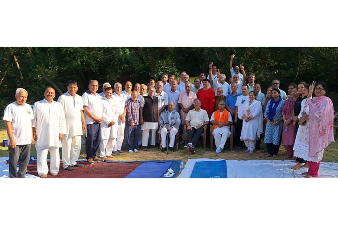 Former Deputy CM Kavinder Gupta and other dignitaries posing together during a symposium at Environmental Park, Raika in Jammu.