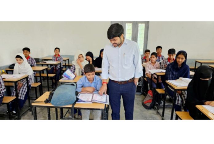 DC Kishtwar during visit to a school on Thursday.