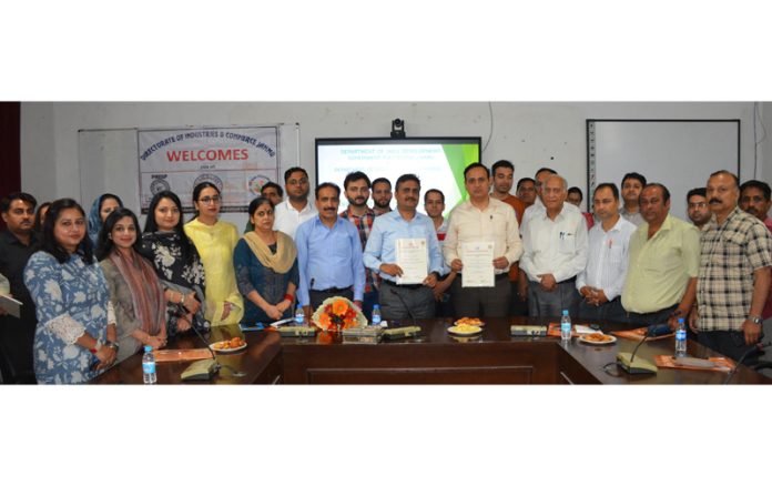Principal, Government Polytechnic Jammu and General Manager, DIC Jammu along with others posing for a photograph after inking an MoU.