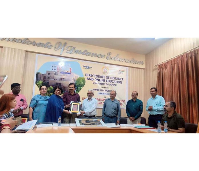 Chief guest being presented a memento by the organizers during valedictory function of three-day workshop.