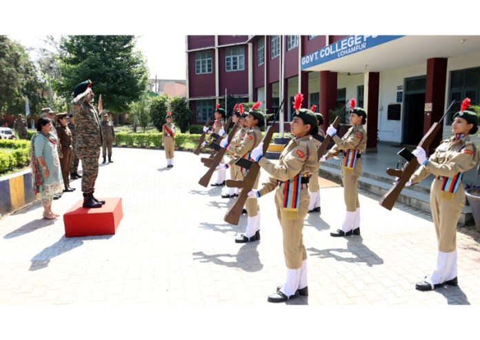 Brig PS Cheema taking the salute from the NCC cadets in Udhampur on Tuesday.