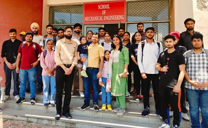 SMVDU alumnus Deepak Sharma with students during visit to the university.