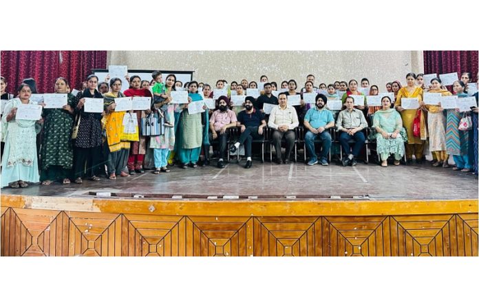 Principal of Govt Polytechnic Jammu and staff with trainees of PM Vishwakarma Scheme during certificate distribution function.