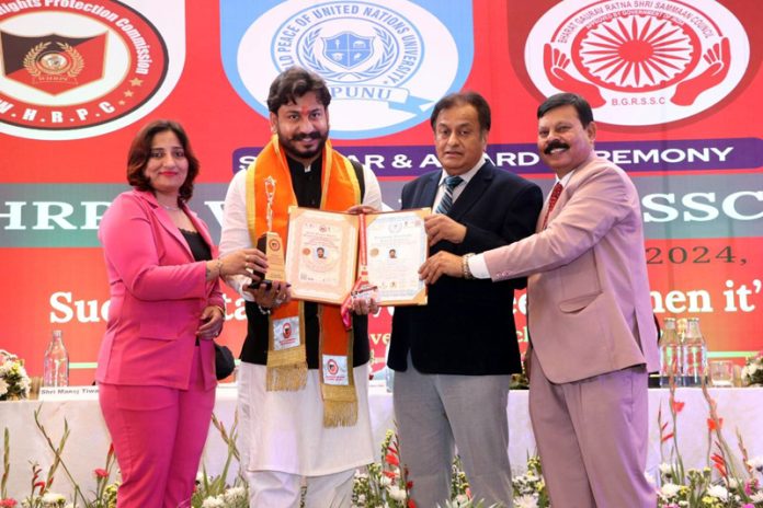 Dr Amit Kumar receiving Honorary Doctorate during a function held in Jammu.