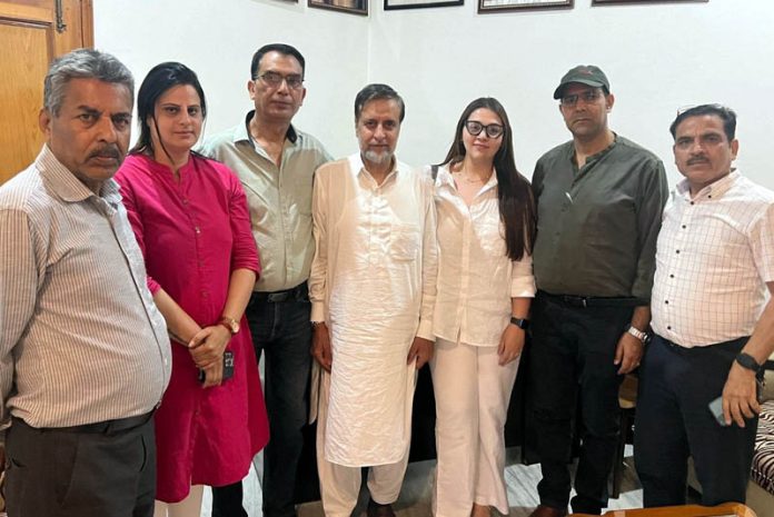 NC Minority Cell leaders during a meeting with party candidate from Anantnag-Rajouri constituency, Mian Altaf at Jammu on Sunday.