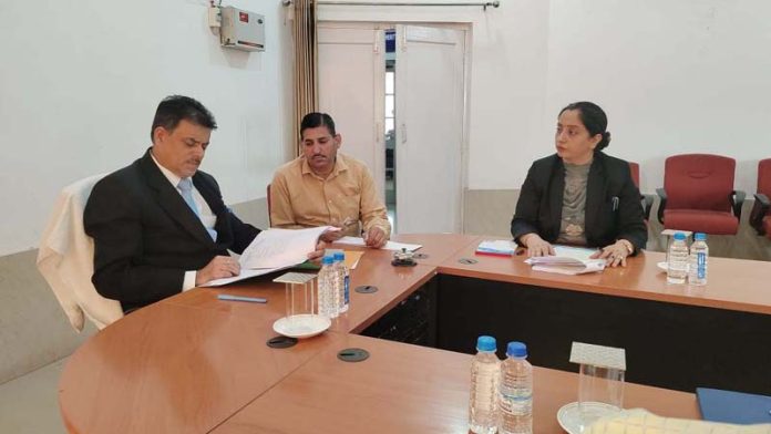 Chairman, DLSA Kathua, A K Shavan and others during a meeting of DMC Kathua on Thursday.