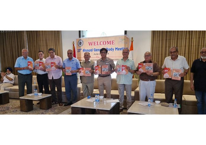 Senior members of CGPWA releasing journal during AGM in Jammu.