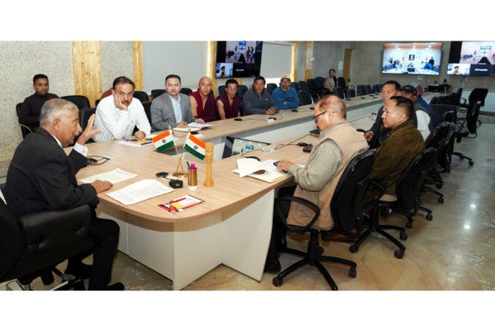 LG Ladakh, Brig (Retd) BD Mishra, chairing a meeting in Leh on Sunday.