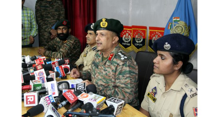 Army, Police & CRPF officers addressing a press conference in Rafiabad, Baramulla. -Excelsior/Aabid Nabi