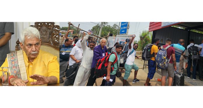 Lt Governor Manoj Sinha reviewing arrangements at Bhagwati Nagar (l) and enthusiastic pilgrims entering Bhagwati Nagar Yatri Niwas on Thursday (r). -Excelsior/Rakesh