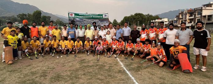 Hockey teams posing along with supporting staff and diginitaries in Poonch.
