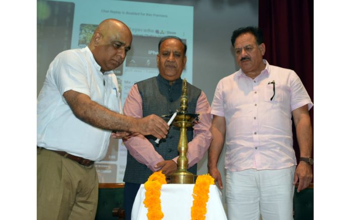 Suresh Kumar Gupta, Principal Secretary, Department of Culture lighting ceremonial lamp to inaugurate a Multilingual Kavi Sammelan in Jammu on Sunday.