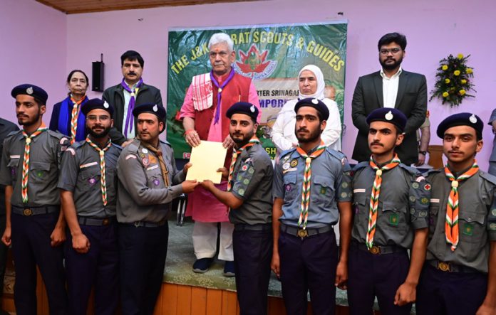 LG Manoj Sinha presenting certificates to Scouts & Guides at Sonamarg.