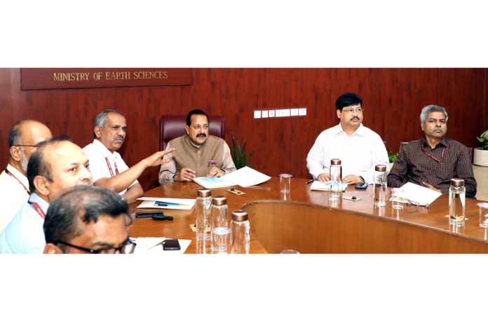 Union Minister Dr Jitendra Singh chairing a meeting to discuss 100 days Action Plan of the Ministry of Earth Sciences on Sunday.