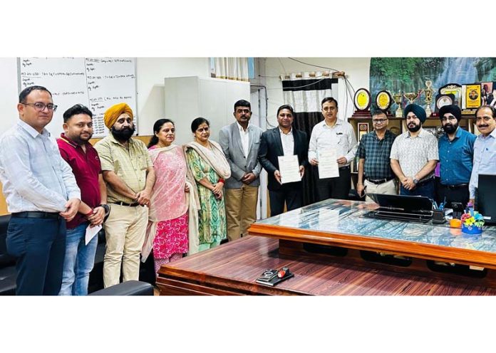 Officials from Government Polytechnic Jammu and Amass Skill Ventures Gurugram during signing of an MoU.