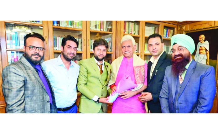 LG Manoj Sinha meeting with delegates at Raj Bhawan on Sunday.