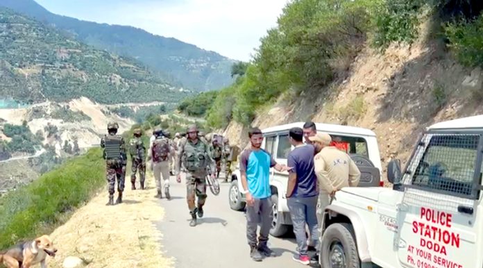 Security forces during searches in hilly areas of Doda on Friday. — Excelsior/Tilak Raj