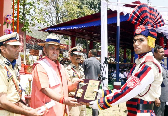 LG Manoj Sinha awarding certificate to a new recruit at STC Talwara on Sunday.