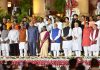 President Droupadi Murmu and Prime Minister Narendra Modi pose for a photograph with new Council of Ministers at the swearing in ceremony at Rashtrapati Bhavan in New Delhi on Sunday. (UNI)