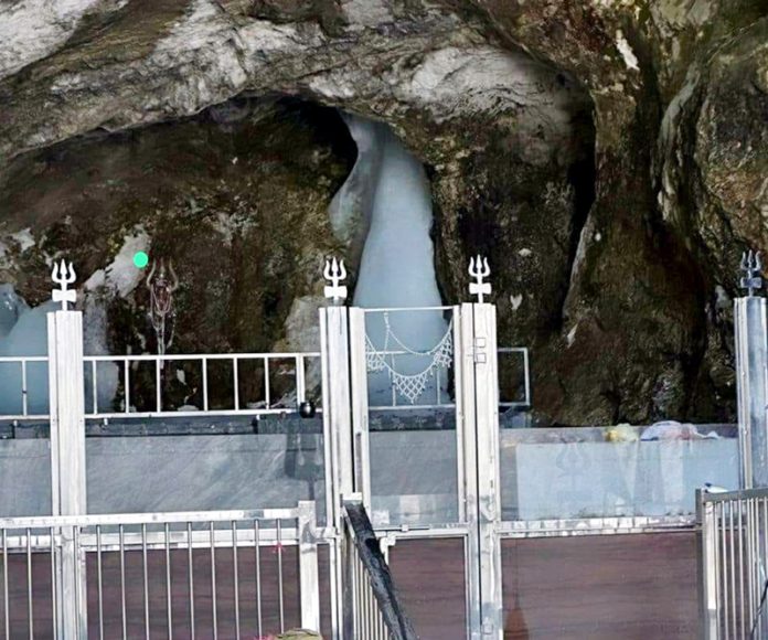 A view of holy Ice Lingam of Lord Shiva at Shri Amarnath Ji cave shrine in South Kashmir Himalayas. -Excelsior/Firdous