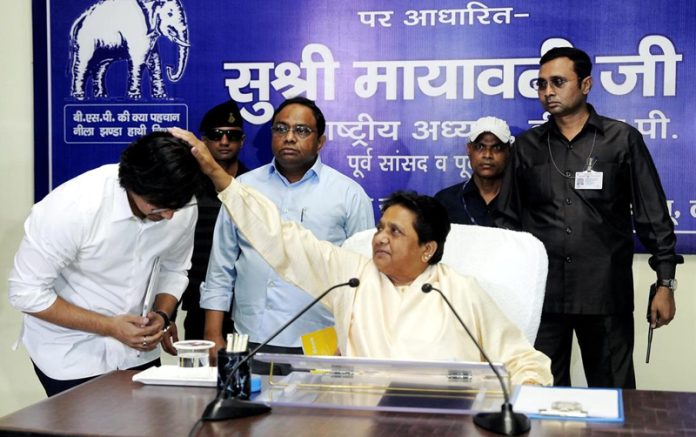 BSP supremo Mayawati blessing Akash Anand at party office in Lucknow on Sunday.