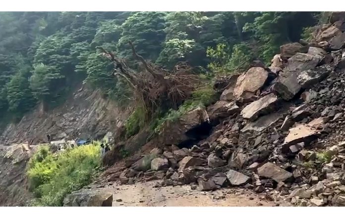 Road blocked due to landslide in Thannamandi area of Rajouri on Sunday. - Excelsior/Imran