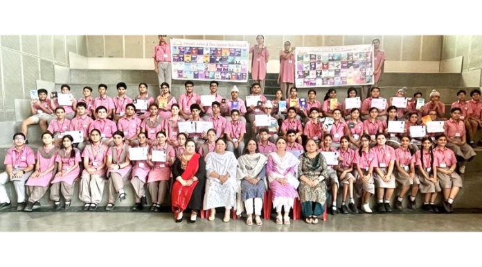 A group of young authors of Jodhamal posing for group photograph along with teaching staff.