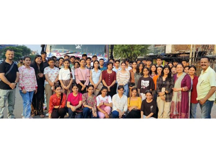Group of students of Aryan Oriental Convent Higher Secondary School, Udhampur posing for group photograph before leaving for Dharamshala.