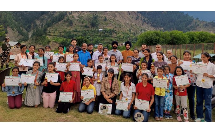 Chess players posing along with dignitaries during the closing ceremony at Bhaderwah.— Excelsior/Tilak Raj