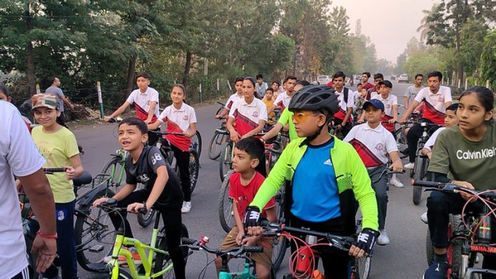 Young cyclists during celebrations of World Bicycle Day in Kathua.