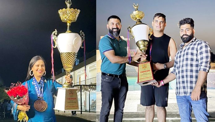 Winners of Iron Rush 9th Mission Slim Possible Summer C'ship Rahul Pandoh and Raminder Sachdeva posing along with their trophies.