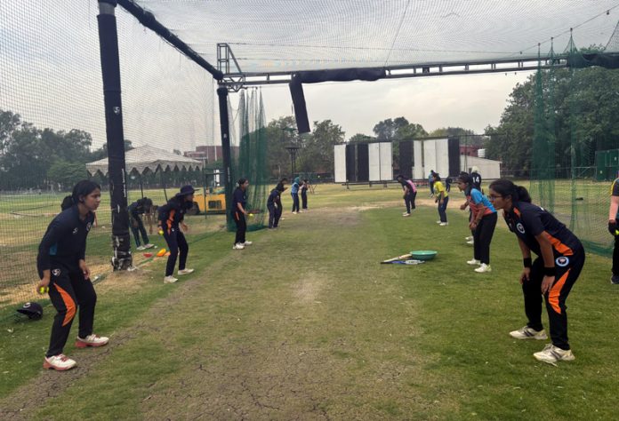 Women cricketers during practice session in Jammu.