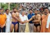 DC Reasi Vishesh Paul Mahajan introducing wrestlers before the main bout at Reasi on Monday.