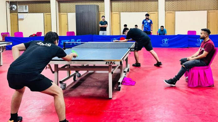 TT players in action in Jammu on Friday.