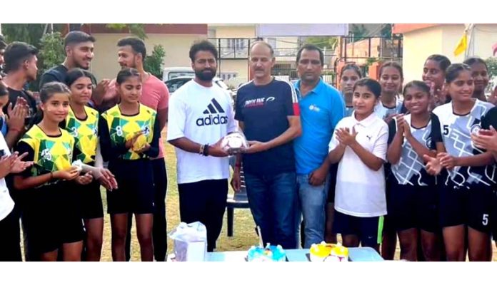 Players being presented Handballs during an event at Jammu.