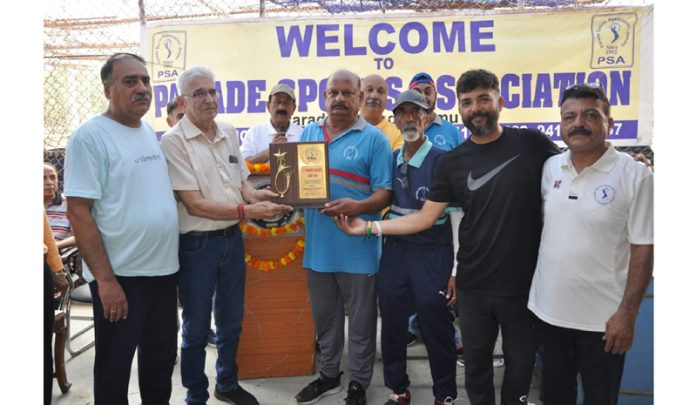 Organisers presenting memento to dignitaries during concluding ceremony of Summer Cricket Coaching Camp at Jammu.