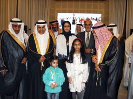 Four-year-old Chess prodigy Hoor Fatima of J&K posing along with diginitaries at Bahrain.