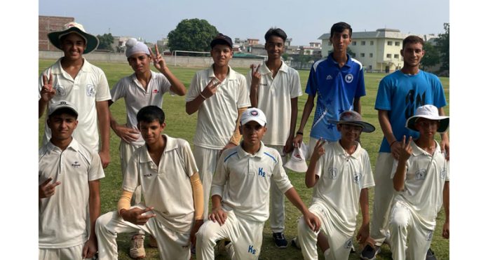 Winning Cricket team posing for group photograph.