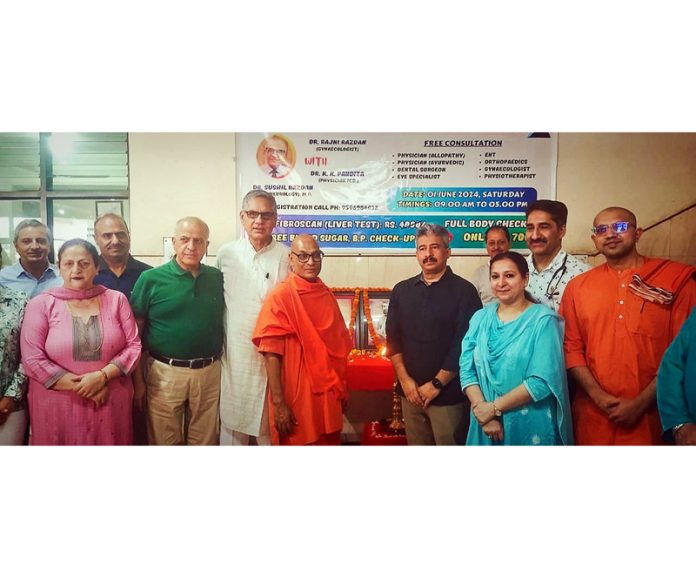 Renowned Neurologist, Dr Sushil Razdan along a team of doctors and other dignitaries during a medical checkup camp at Jammu on Saturday.