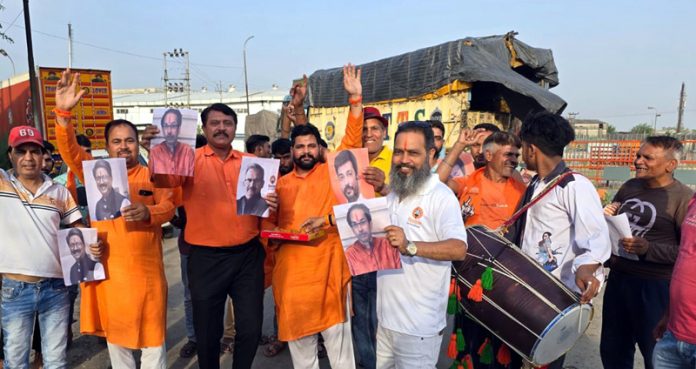 Activists of Shiv Sena Bala Saheb Thackeray celebrating party's victory in Maharashtra, at Jammu.