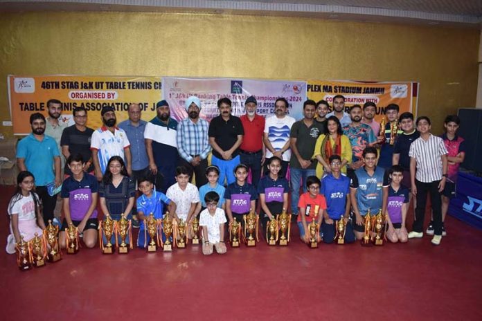 Young TT players posing along with dignitaries during a Championship at Jammu on Saturday.  