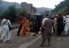 People rescuing injured passengers as minibus overturns on road in Thannamandi area of Rajouri. —Excelsior/Imran