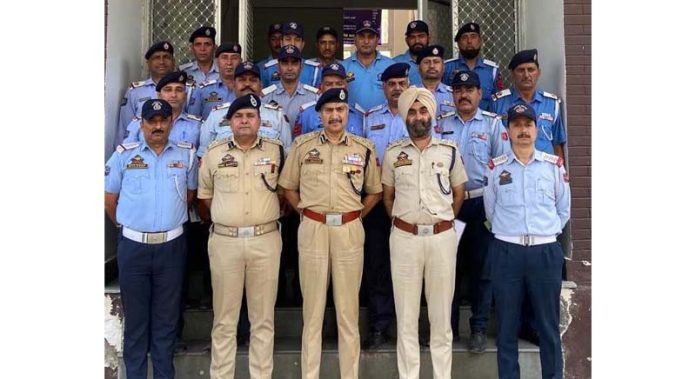 DIG Traffic Jammu Zone, Dr Mohammad Haseeb Mughal, along with other officers outside the office of SSP Traffic NHW Ramban on Thursday.