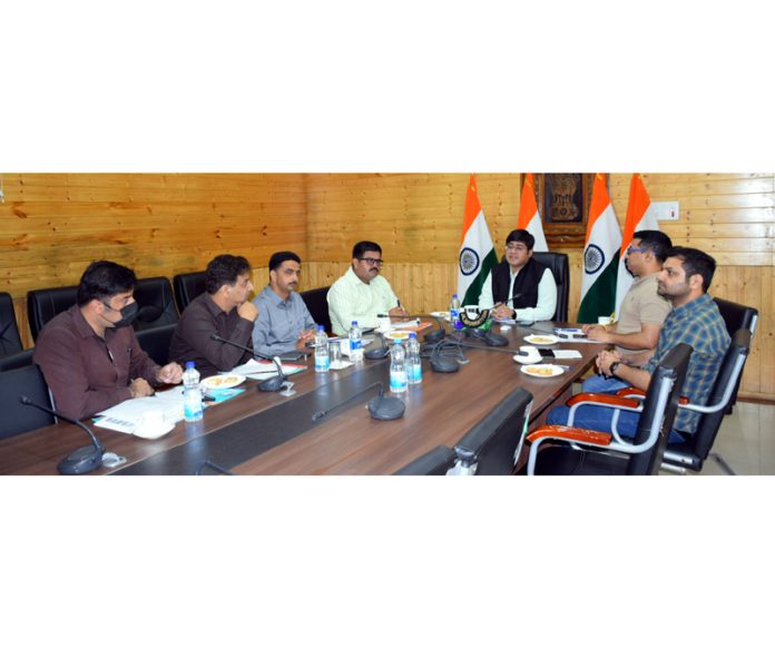 Director Information J&K Jatin Kishore chairing a meeting on Monday.
