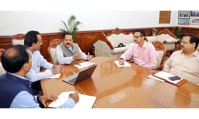 Union Minister Dr Jitendra Singh holding a high-level meeting to review the 100 days Action Plan of the Department of Space at New Delhi on Thursday. Also seen is Chairman ISRO, S. Somanath.