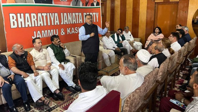 BJP National gen secy Tarun Chugh addressing party leaders during a meeting at Srinagar on Friday.